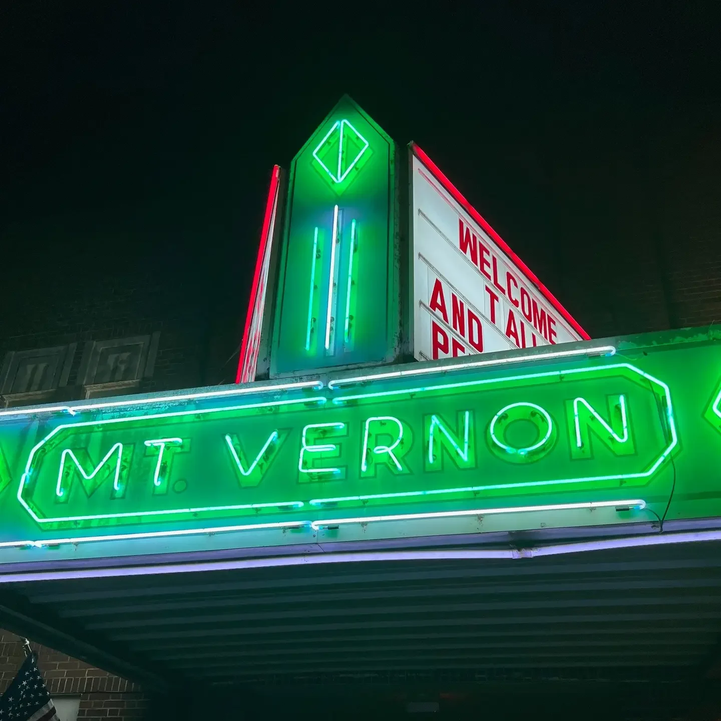 The vintage neon sign of the Mount Vernon Performing Arts Center calls to movie goe-ers and conference attendees alike in the greater Montgomery Area.